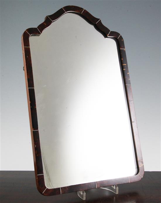 A small tortoiseshell framed wall mirror,